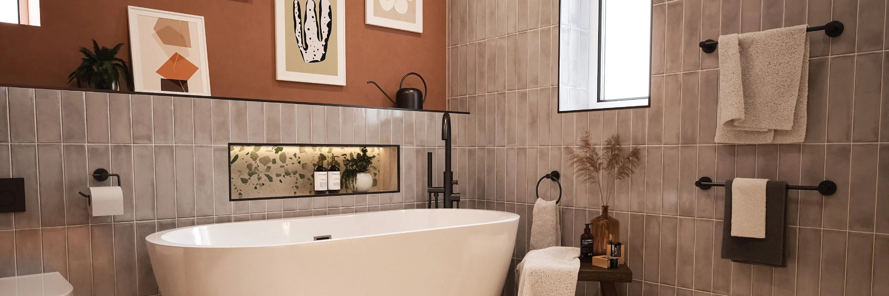 Modern Decorative bathroom theme orange painted walls with matt black bathrom accessoreis